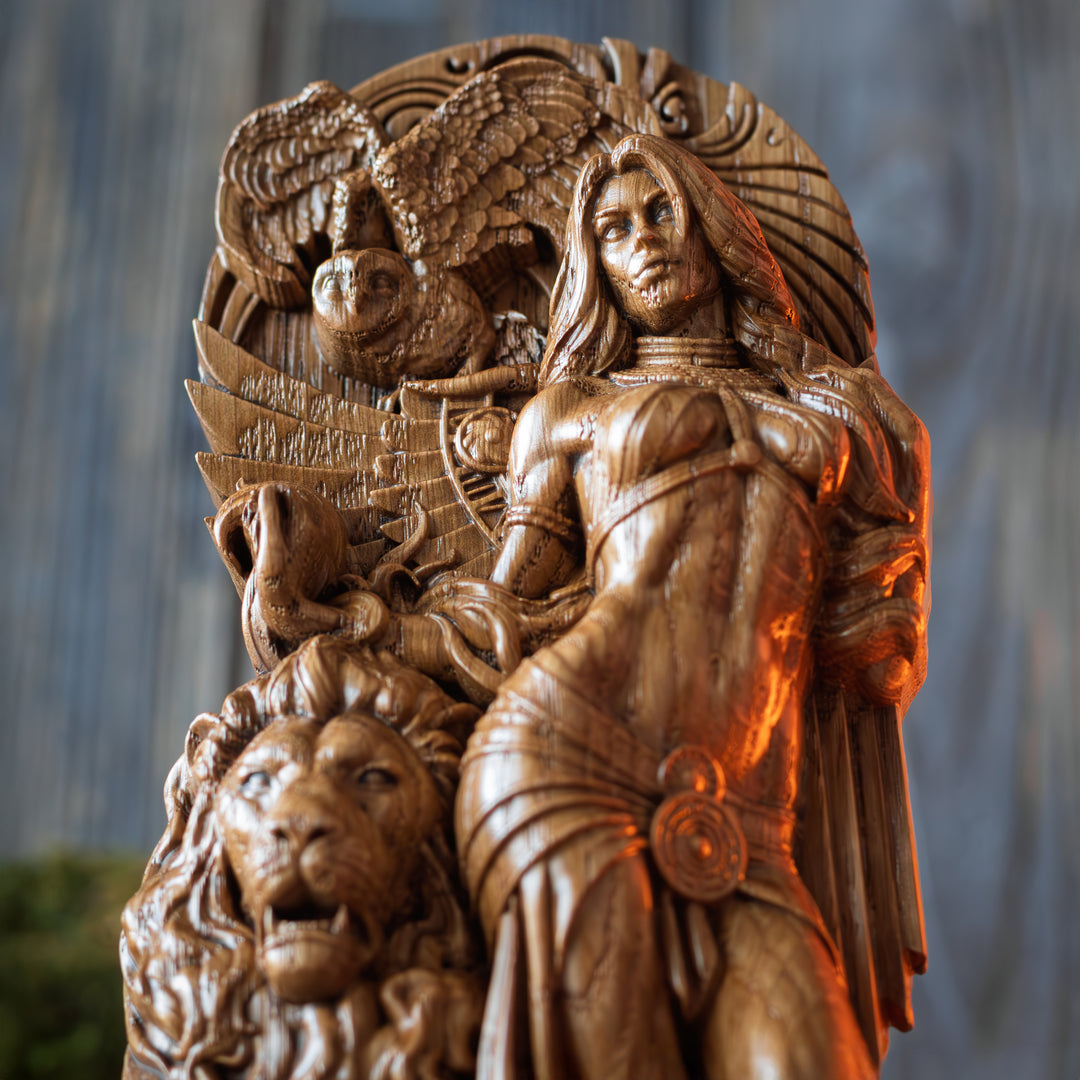 Angled shot of Ishtar statue showing detailed owl, wings, face and flowing hair.