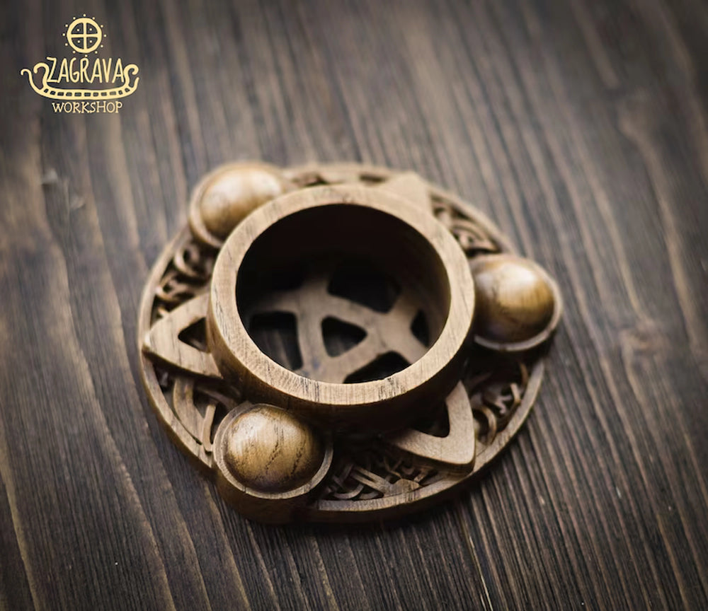 Candle holder with Norse ornaments from oak "Triquetra"