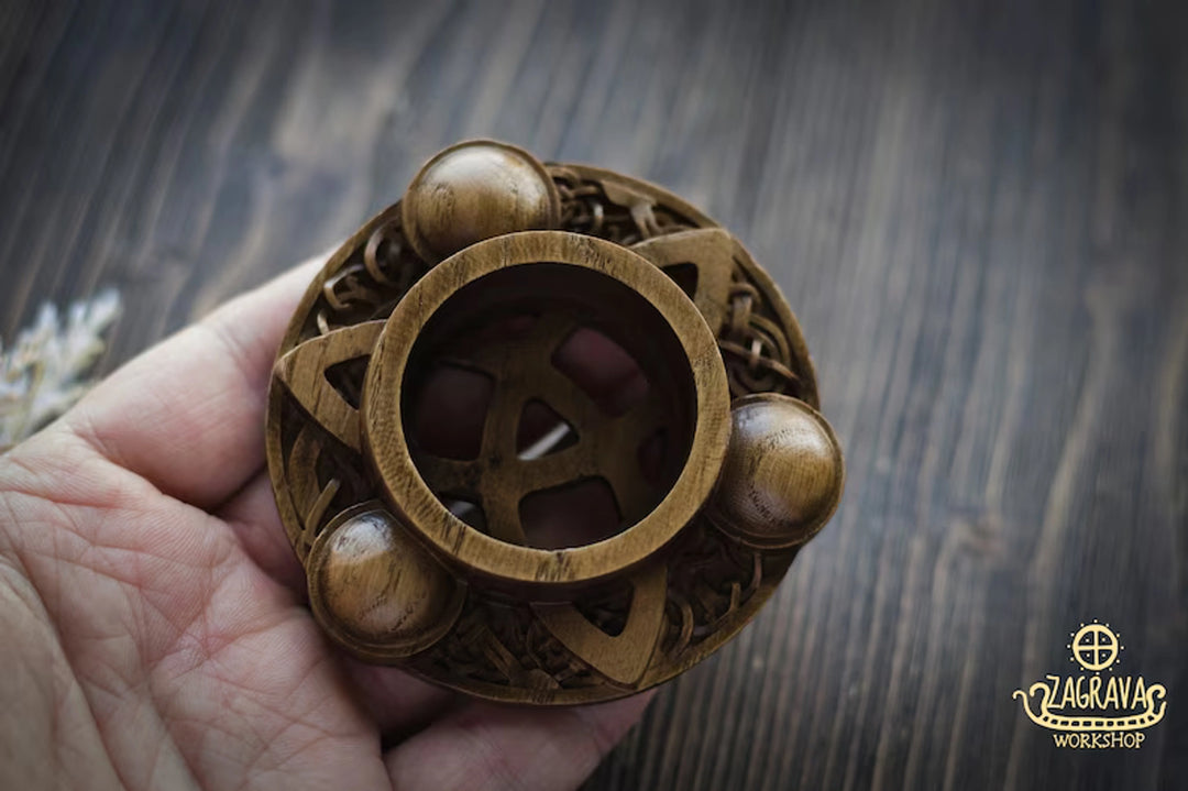 Candle holder with Norse ornaments from oak "Triquetra"